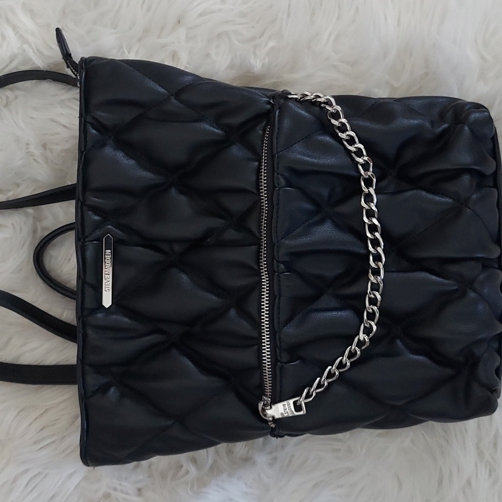 Steve Madden Black quilted backpack, chain zipper.  Very nice!